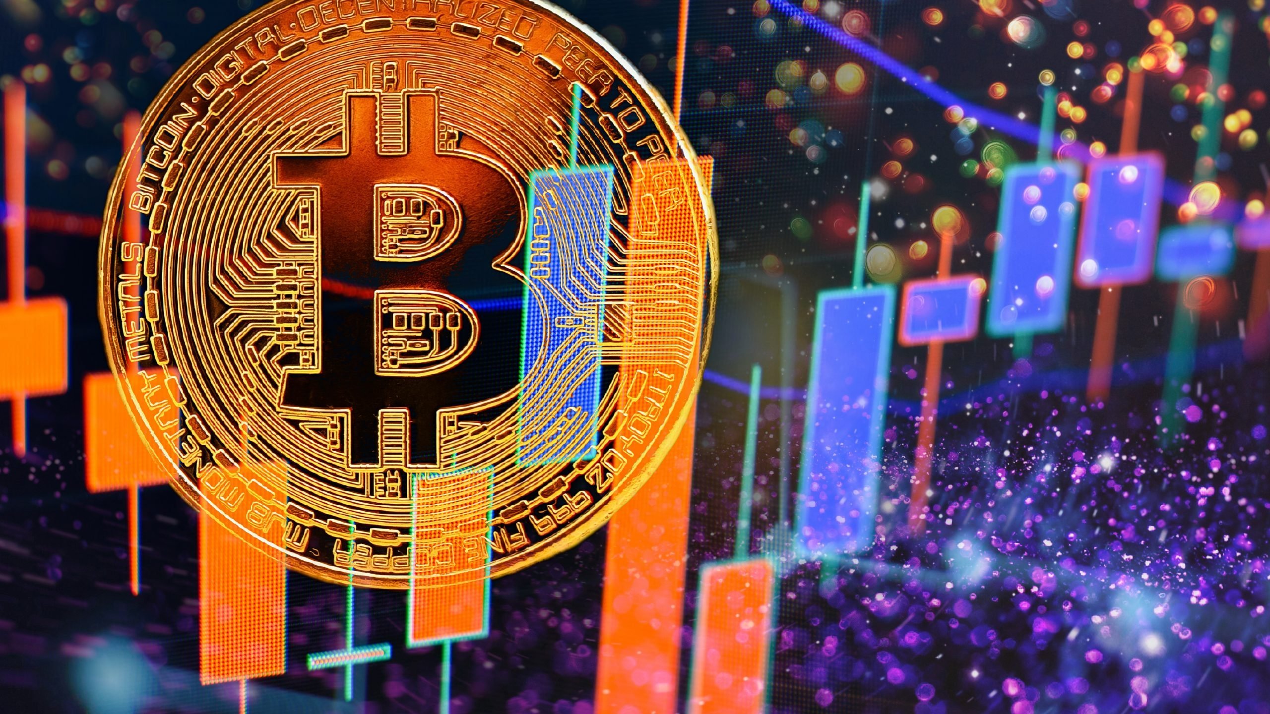 A large physical Bitcoin shown behind red and blue price candles (bitcoin investing)