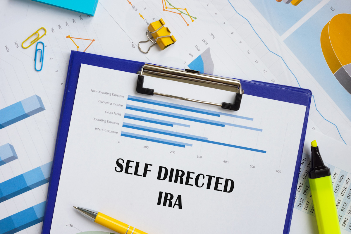 Self Directed IRA is written on a clipboard
